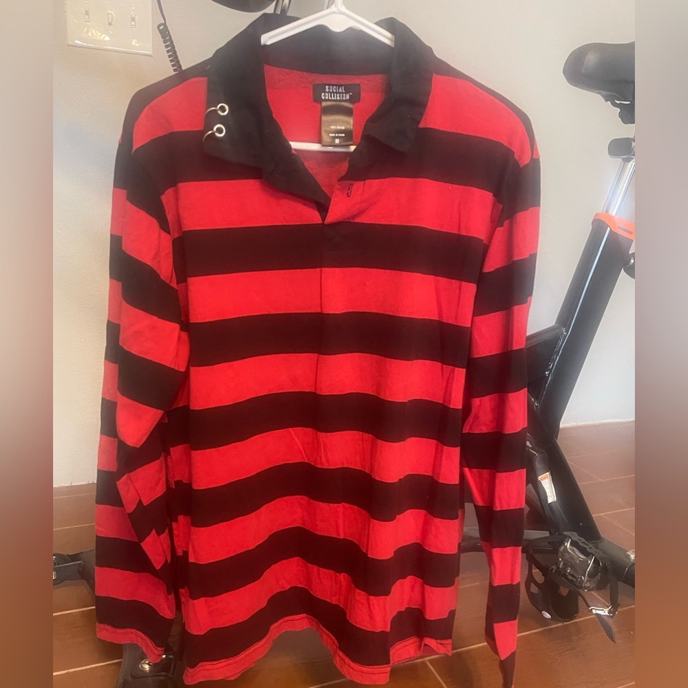 Bright red and black long sleeved.  Purchased new from Hot Topic.  Worn once.